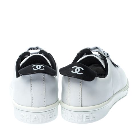 chanel white leather sneakers.